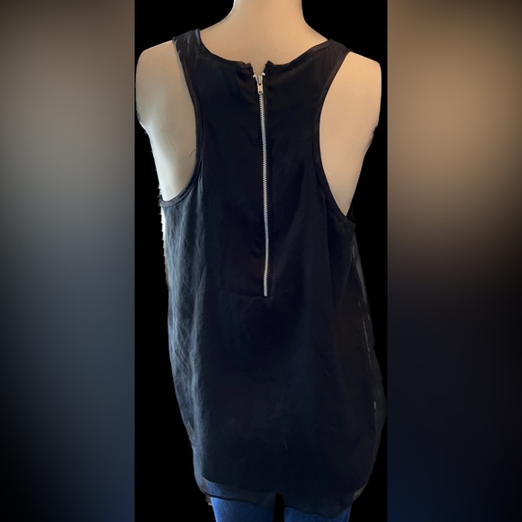 Black flowy chiffon top with sparkle detail and zipper back. Fits like a medium - Picture 2 of 3